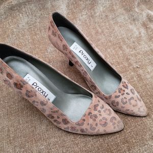 Designer size six leopard print suede heels